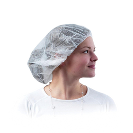White disposable mob cap worn by a woman, 100 pack